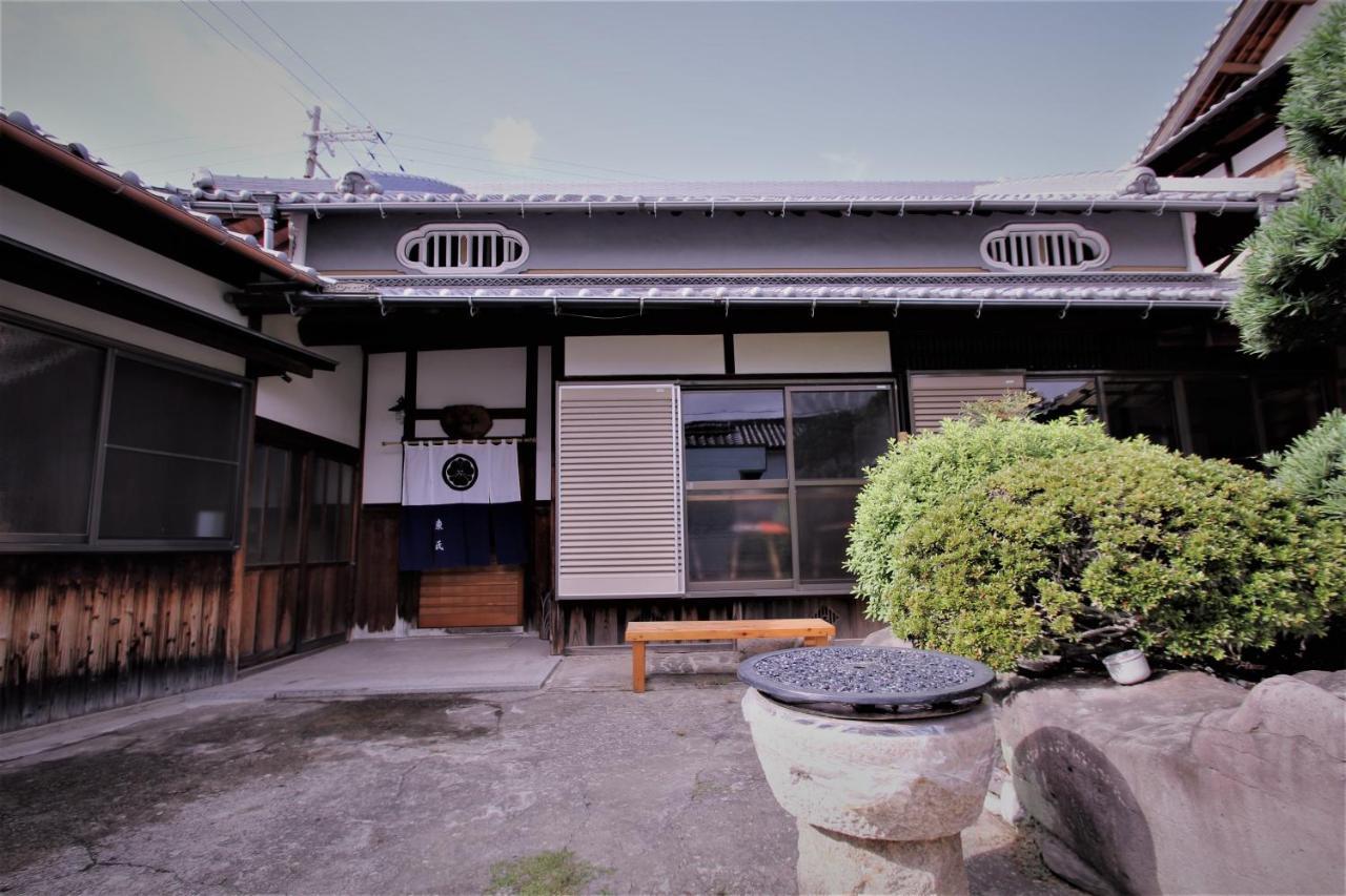 ゲストハウス喜平 Kaizuka Bagian luar foto
